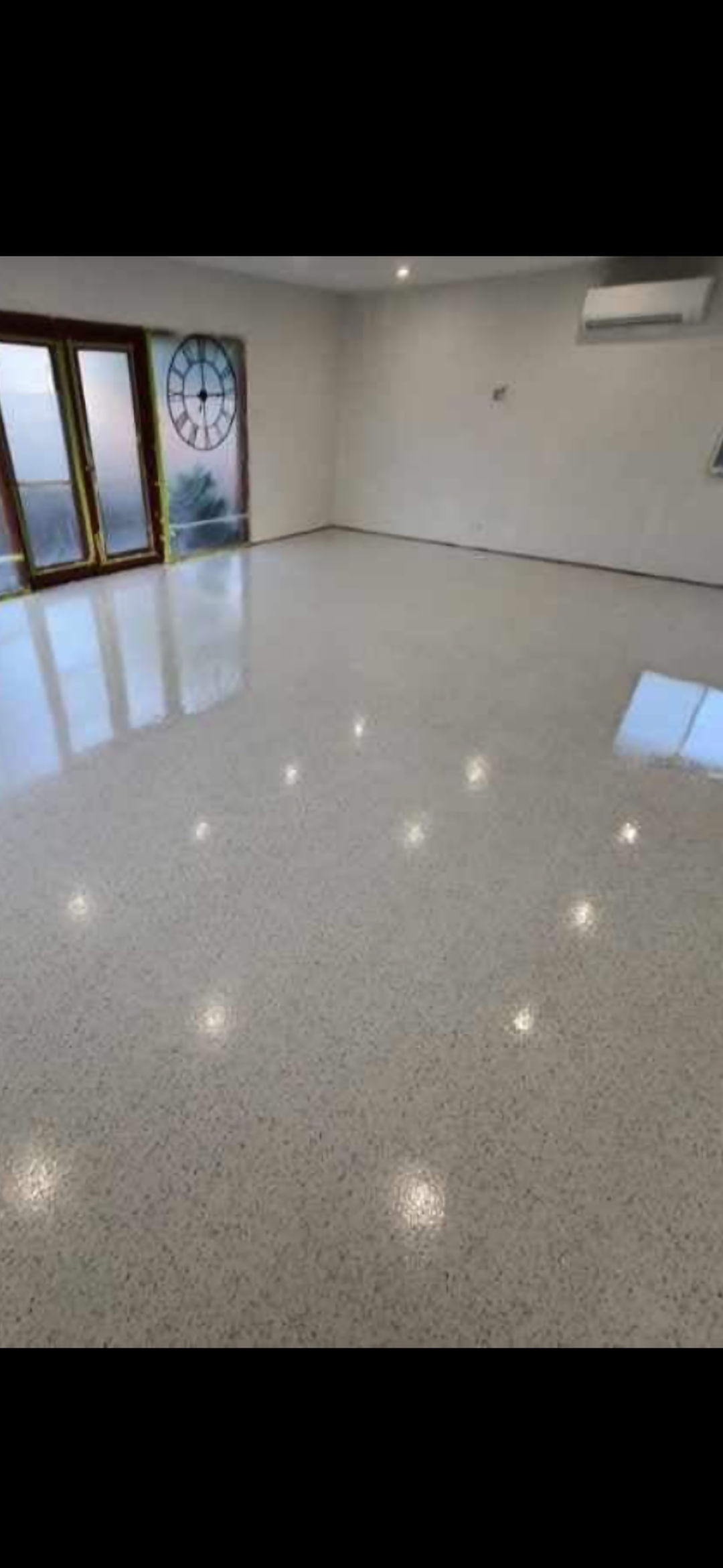 Professional epoxy flooring installation Adelaide - decorative vinyl flake finish on residential garage floor by Epoxy Bros South Australia