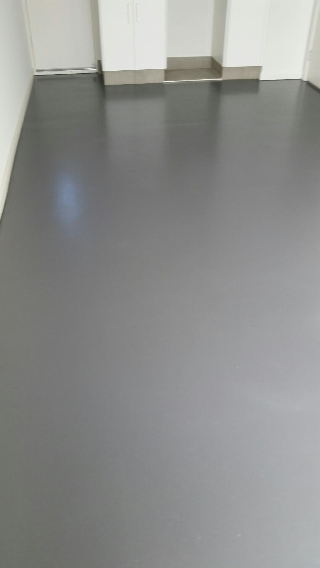 Epoxy Bros team installing professional epoxy flooring in Adelaide South Australia