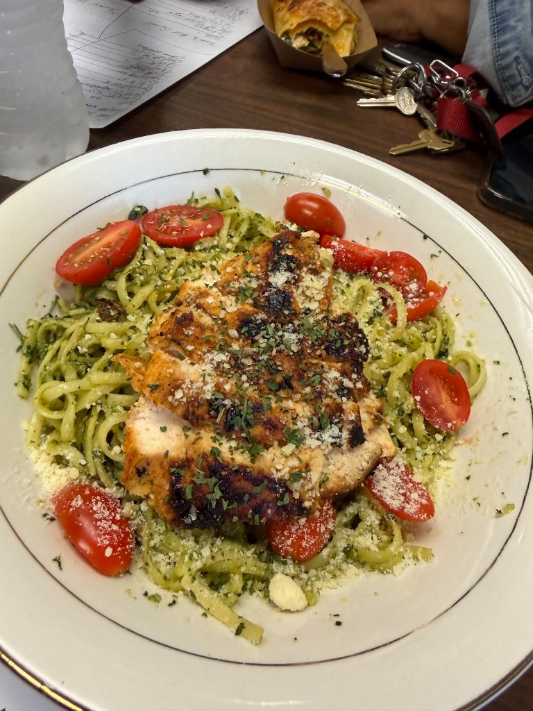 Pesto pasta with grilled chicken and cherry tomatoes