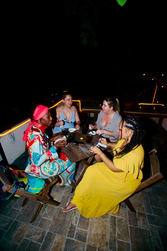 Guests dining at a Tulum retreat event
