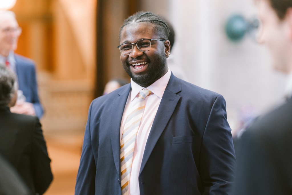 Smiling attendee
