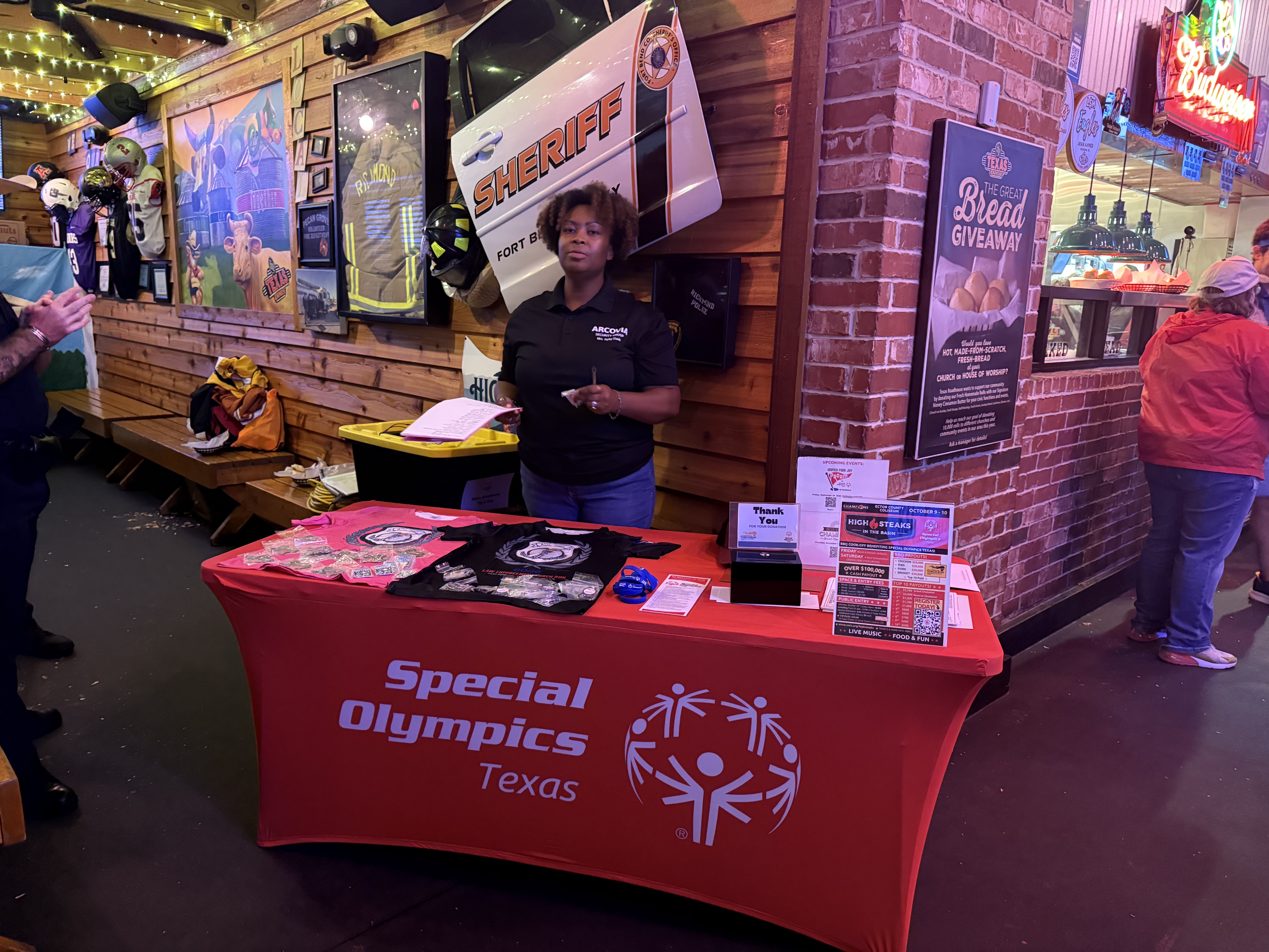 Arcovia volunteers at Special Olympics Texas booth