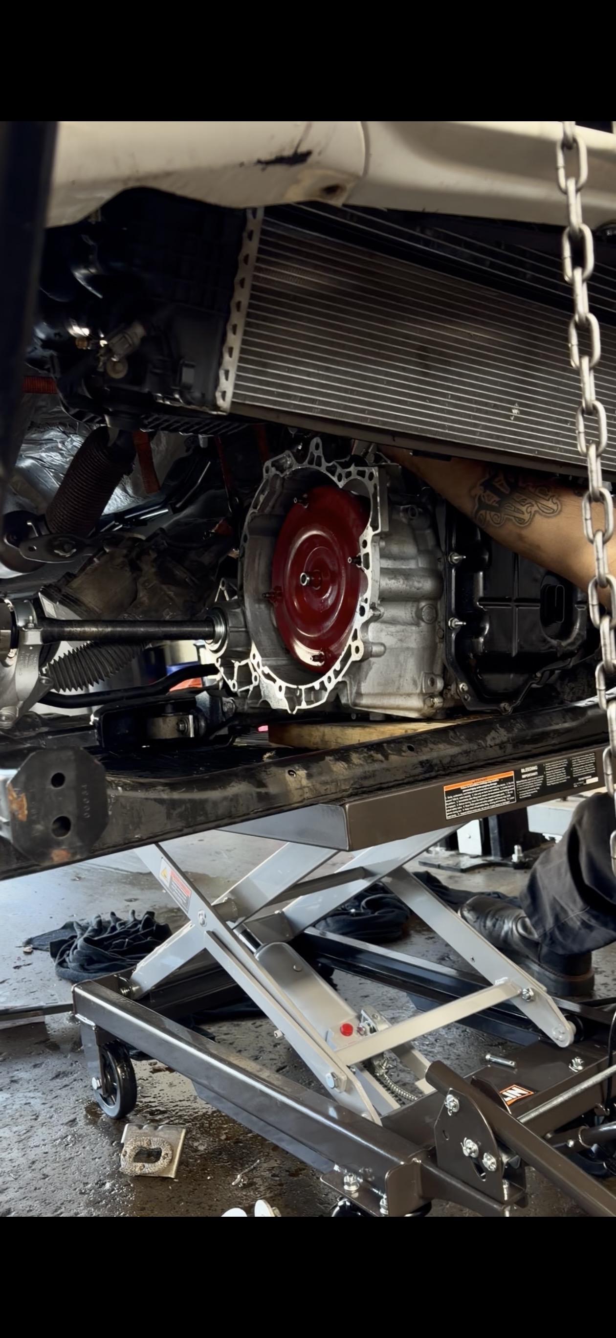 Transmission and drivetrain service on the lift