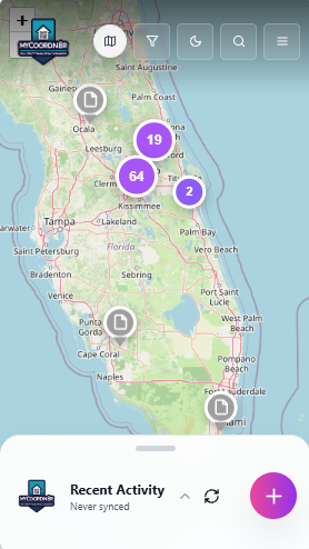 MyCoordn8r home-screen map with territory markers and recent activity; private property details and financial values are obscured.