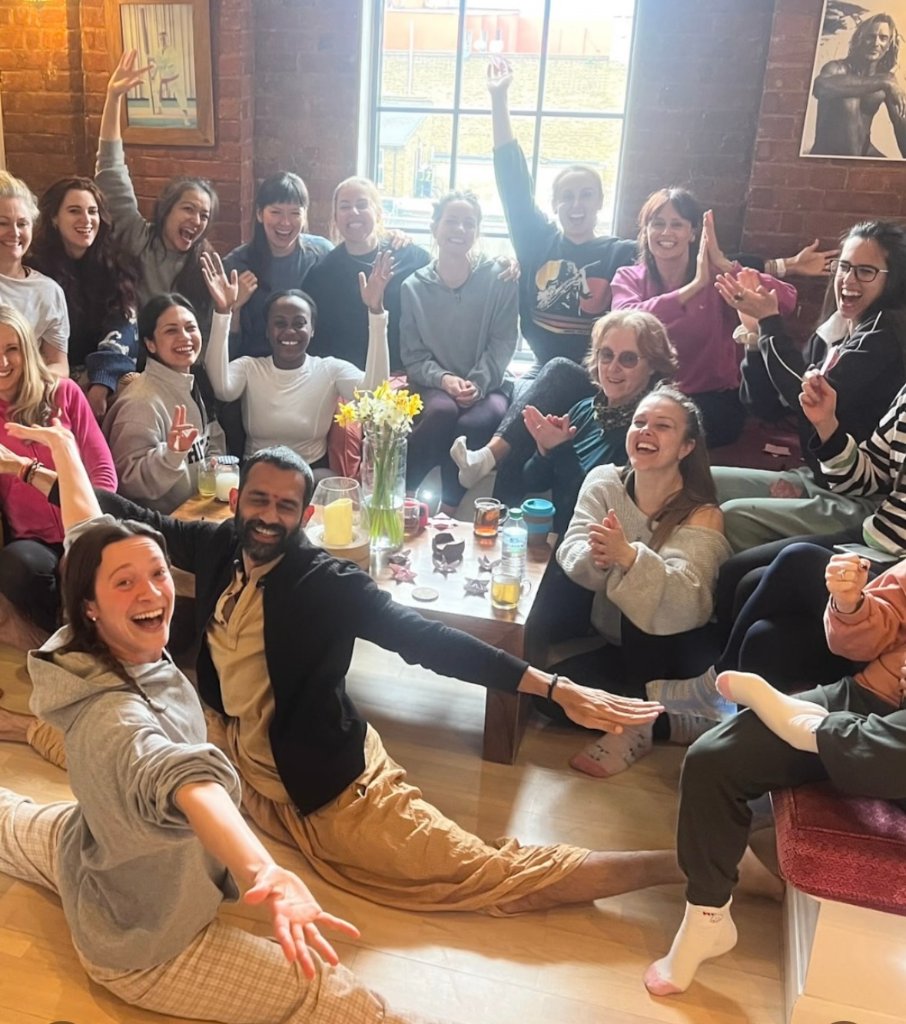 Joyful group gathering in the yoga studio