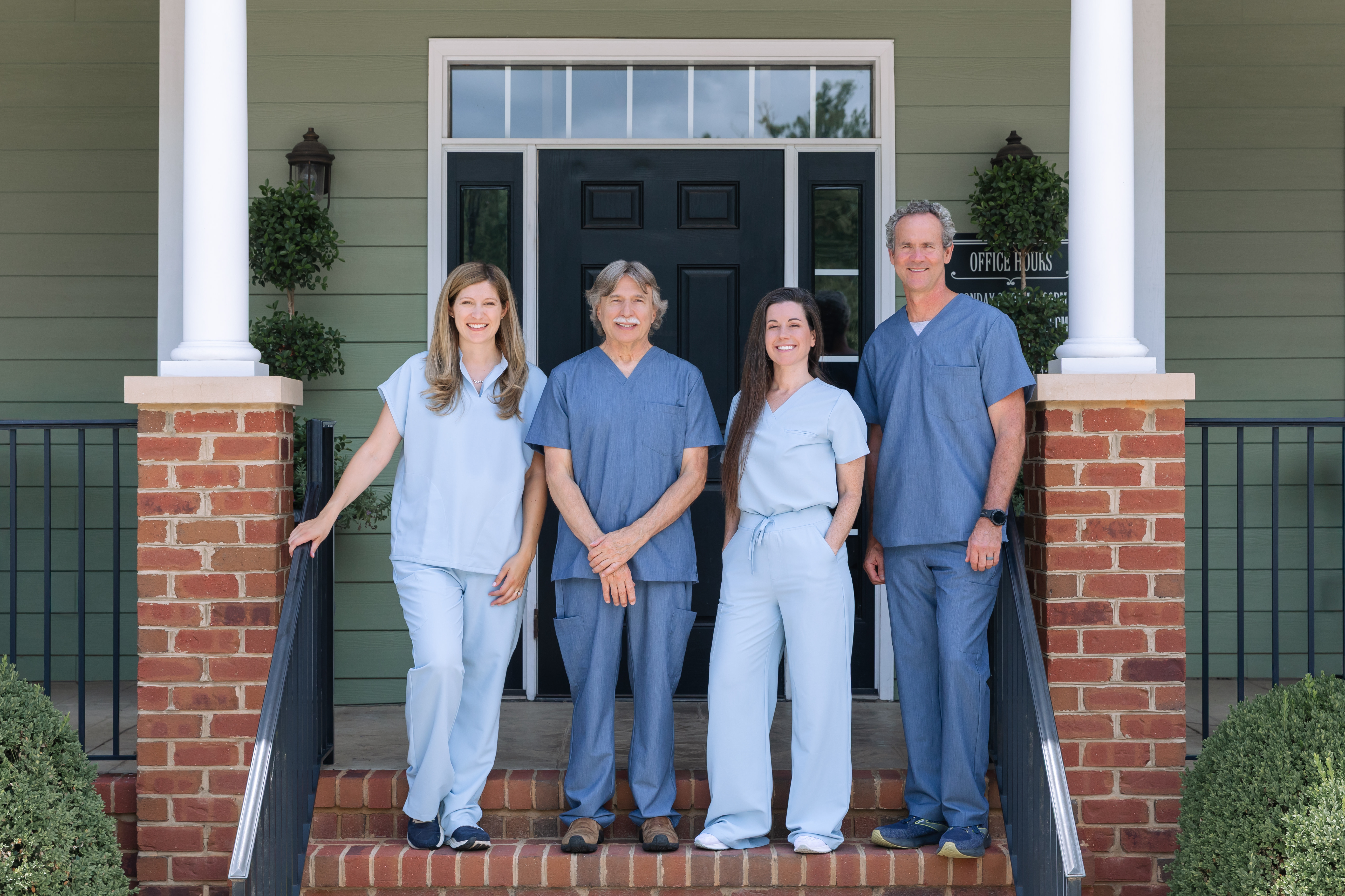 Our veterinary ophthalmologists standing on the front steps of Animal Eye Care of Richmond