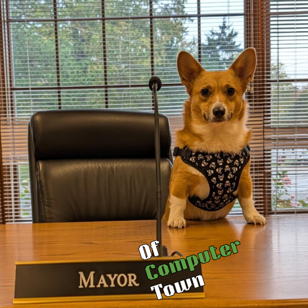 Mabel - Chief Treat Officer at The Pixel Shield, seated at the mayor's desk