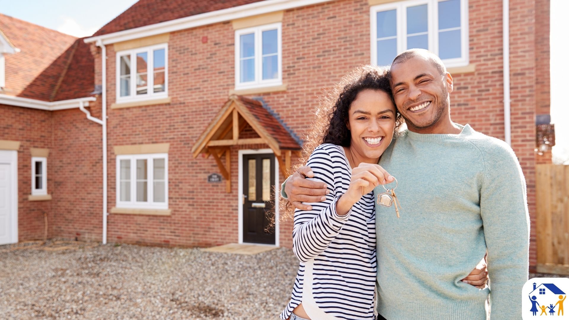 Happy Basingstoke homeowners with their new house keys - your local mortgage advisor