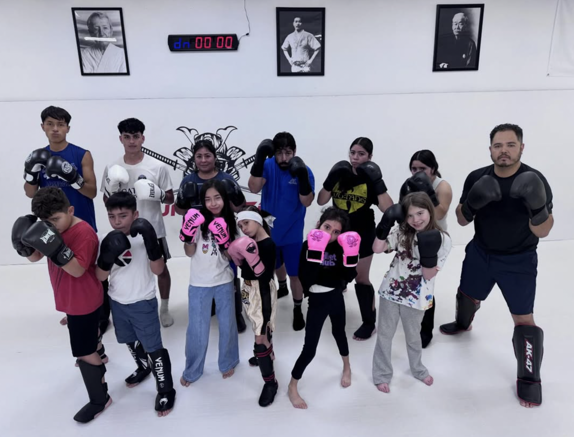 The Untamed Muay Thai and kickboxing group in gloves