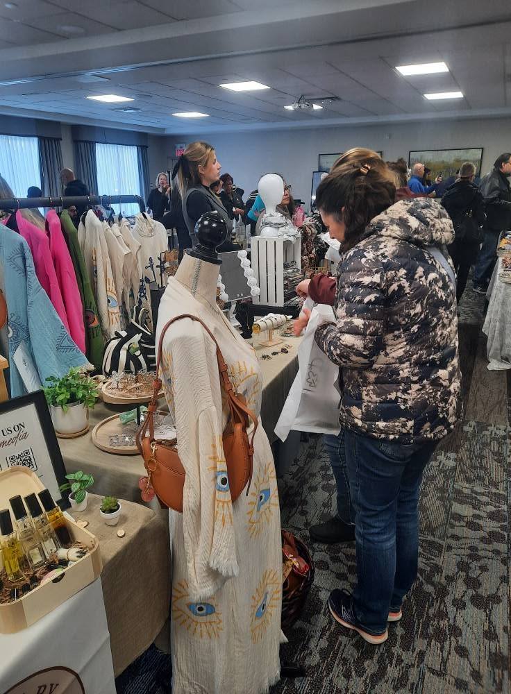 Apparel and accessories booth with evil-eye prints