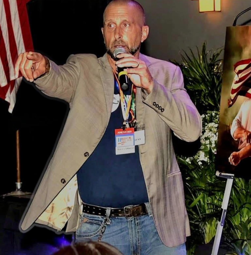 Rocci J. Stucci — speaking on stage at Rock The Boat conference