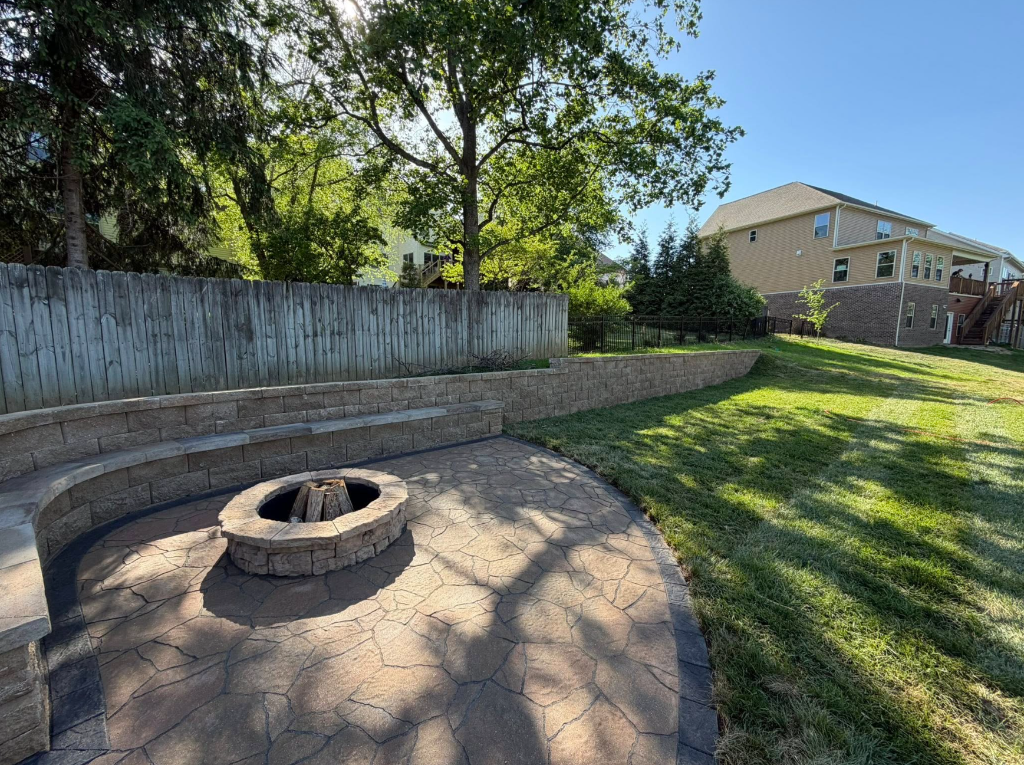 Backyard Transformation - Retaining Walls, Stamped Patio & Custom Fire Pit 1