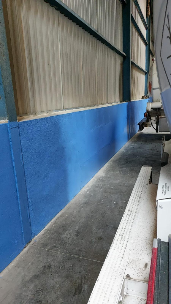 Reconstrucción de Pared Industrial — Salas Simó