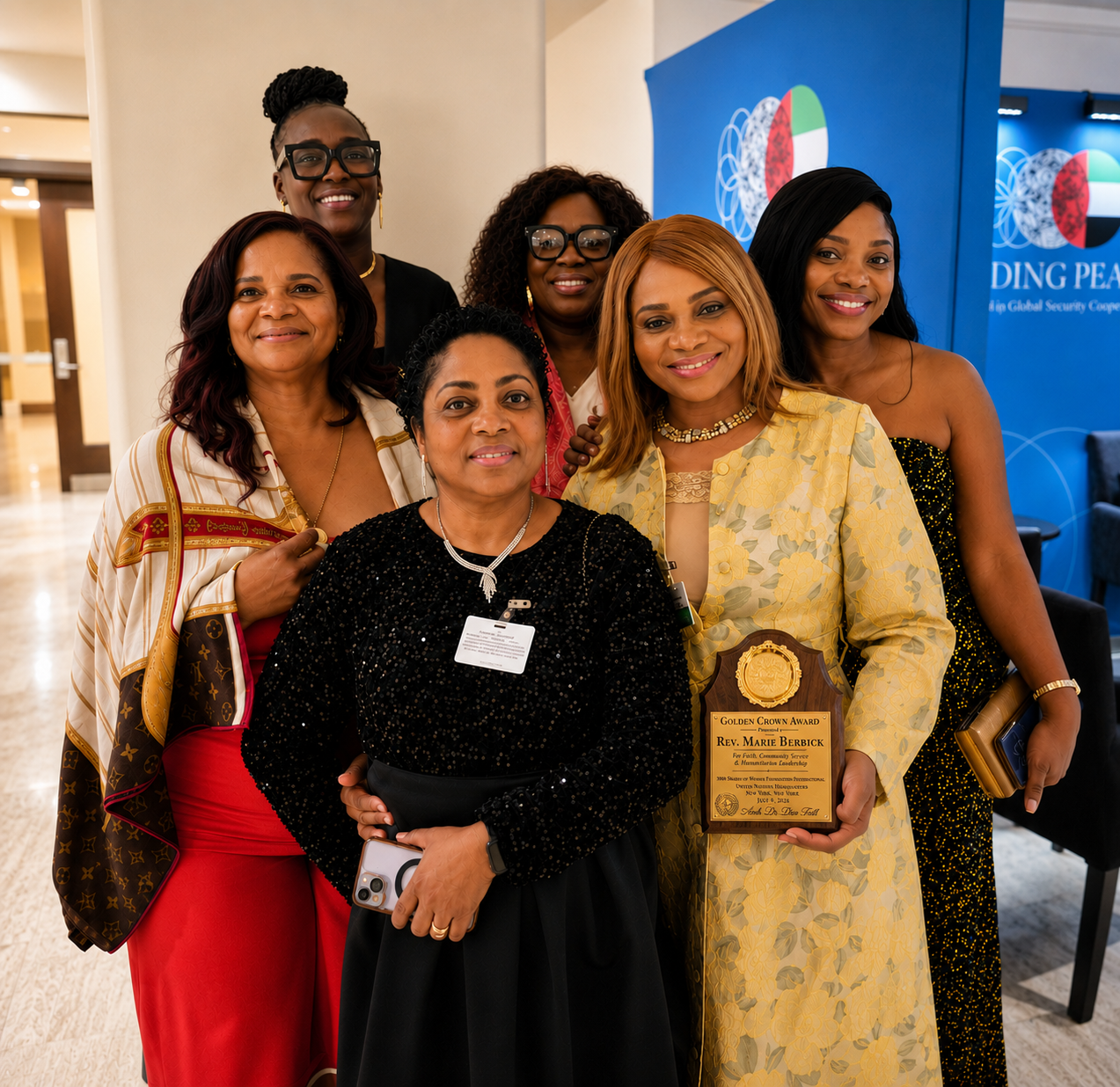 Rev Marie Berbick receiving the Golden Crown Award at the UN 1000 Shades of Women Foundation International Gala — United Nations Headquarters, New York, July 2026