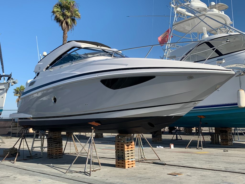 White yacht hull with sleek marine graphics