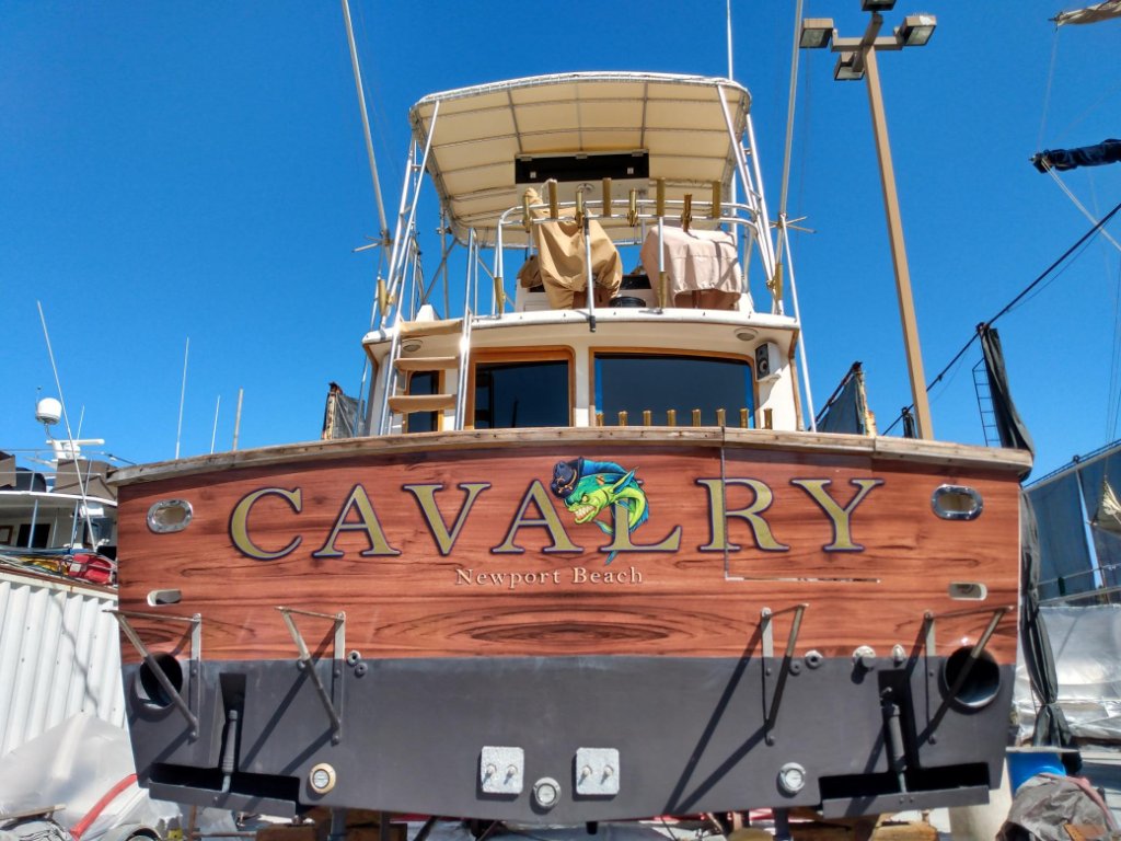 Custom transom lettering on Cavalry yacht