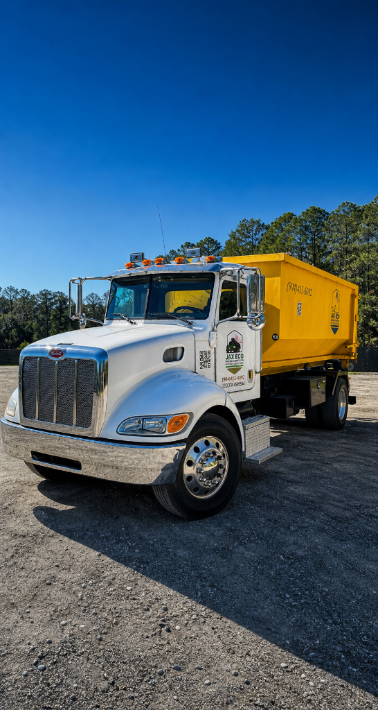 JAX ECO construction debris removal truck at job site Jacksonville FL