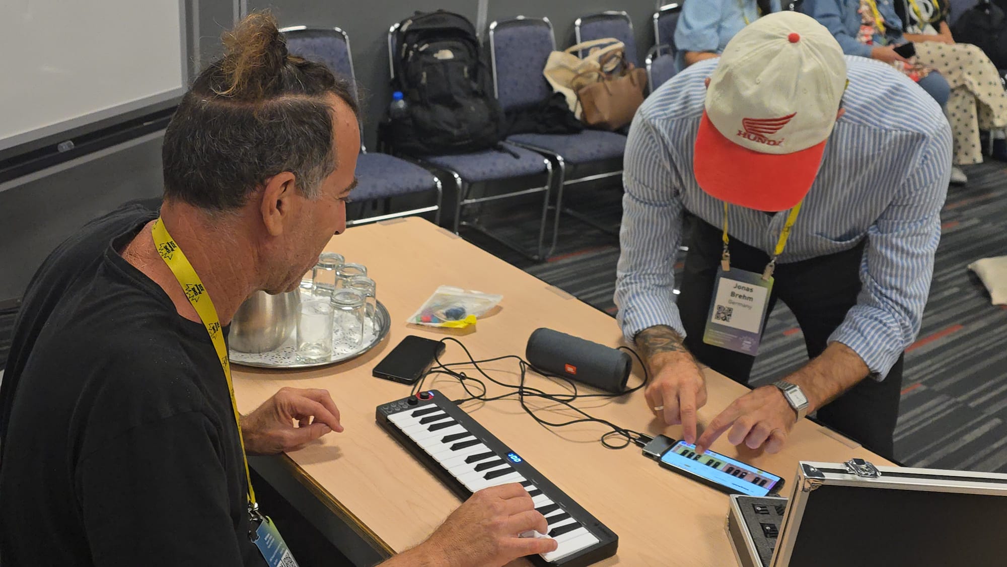 Educators exploring microtonal scales together