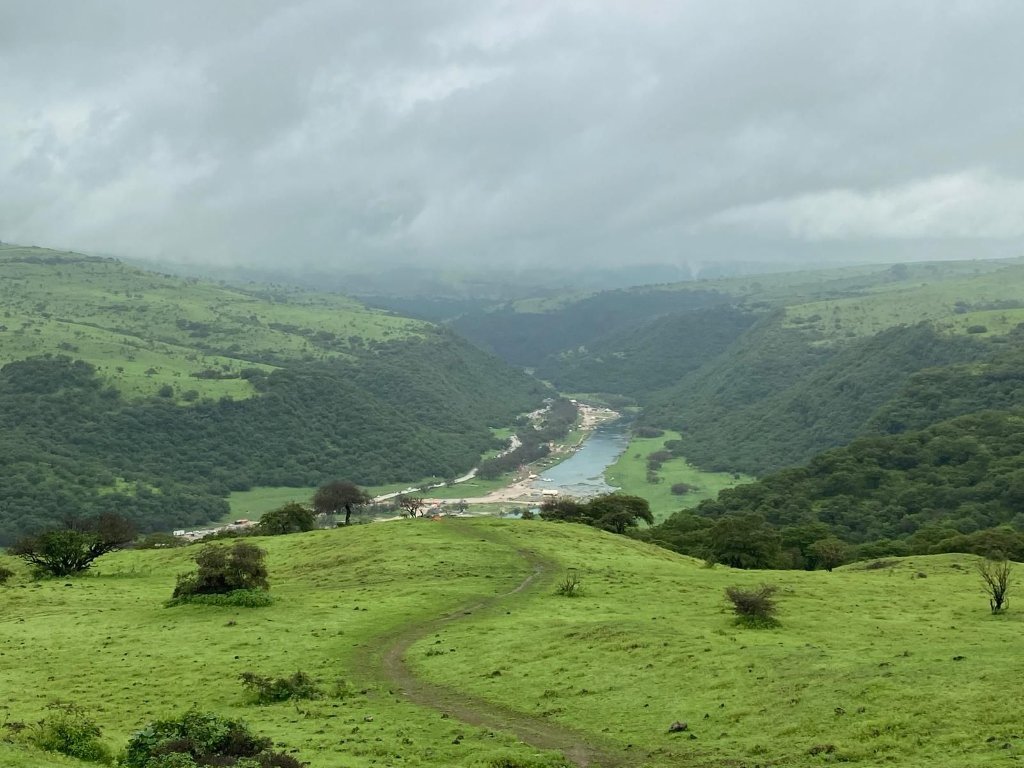 Green valley near Ayn Athum waterfall during Khareef Salalah