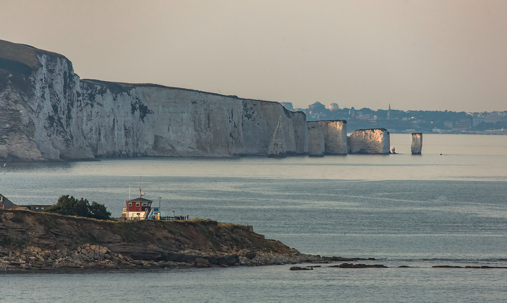 NCI lookout station on the Dorset coastline with Old Harry Rocks in the background