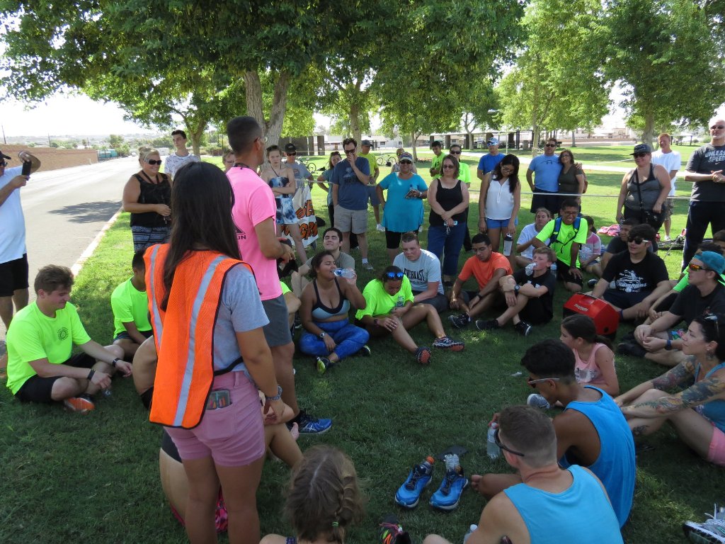 Desert Juggernauts team huddle on grass pre-race training session Arizona