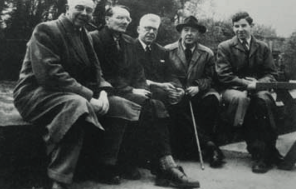The Inklings – a young Peter, in the early 1960s, sitting next to C S Lewis. Also in the group is Peter's father Robert.