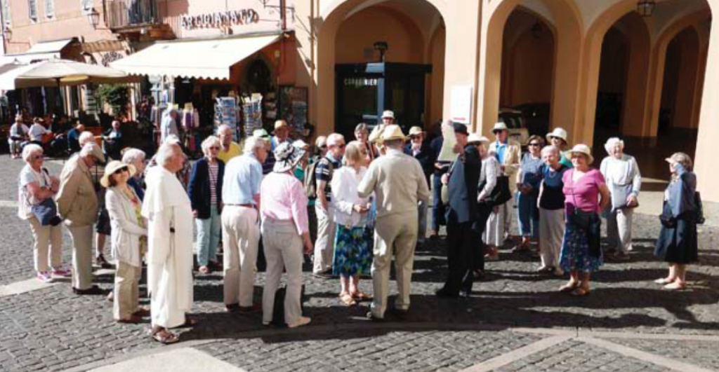 Newman members gathered in the town square at Castel Gandolfo