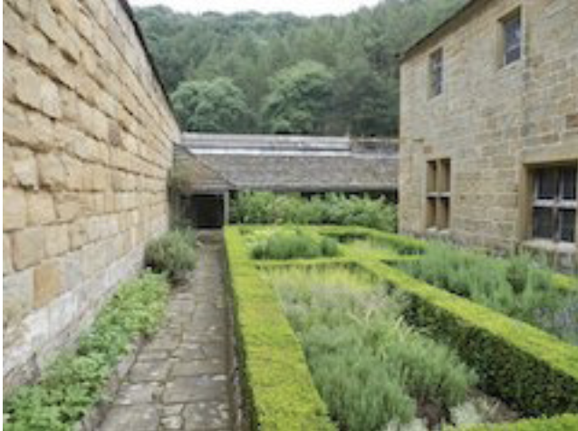 A reconstructed monk's cell, with garden, at Mount Grace Priory