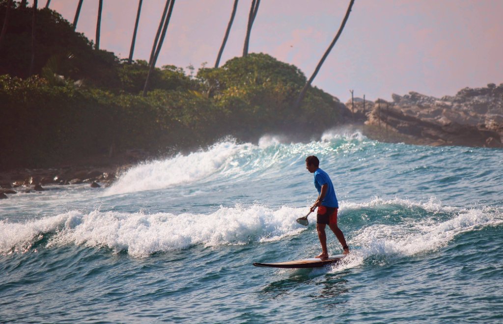 SUP downwind, point break at dusk, Sri Lanka