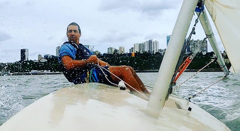 Laser dinghy sailing in the rain, Maputo