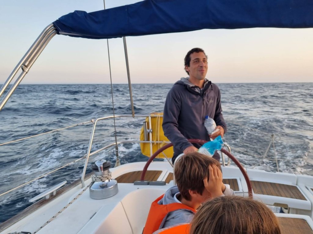 At the helm at dusk — Sesimbra → Culatra passage (2021)