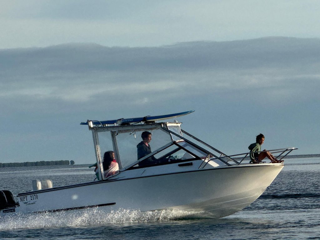 My Coronet 21DC under way, 2×100hp outboards, my daily boat in Maputo