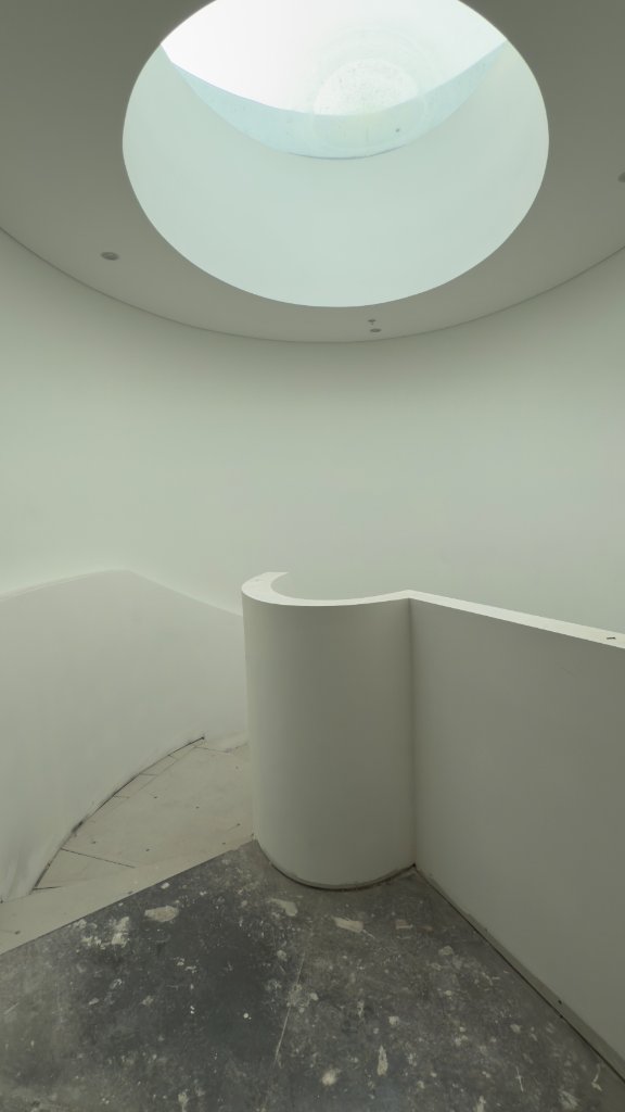 Circular Skylight — Spiral Staircase Entry