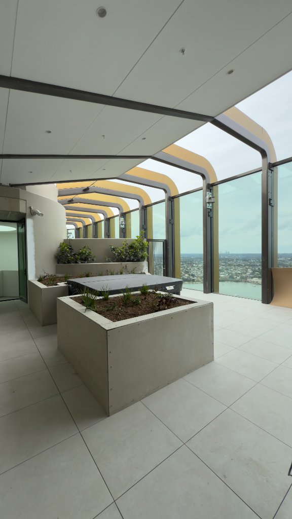 Rooftop Terrace — Curved Pergola Structure