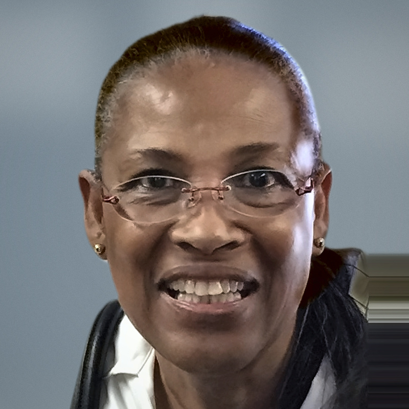 A woman smiling during a one-on-one career conversation