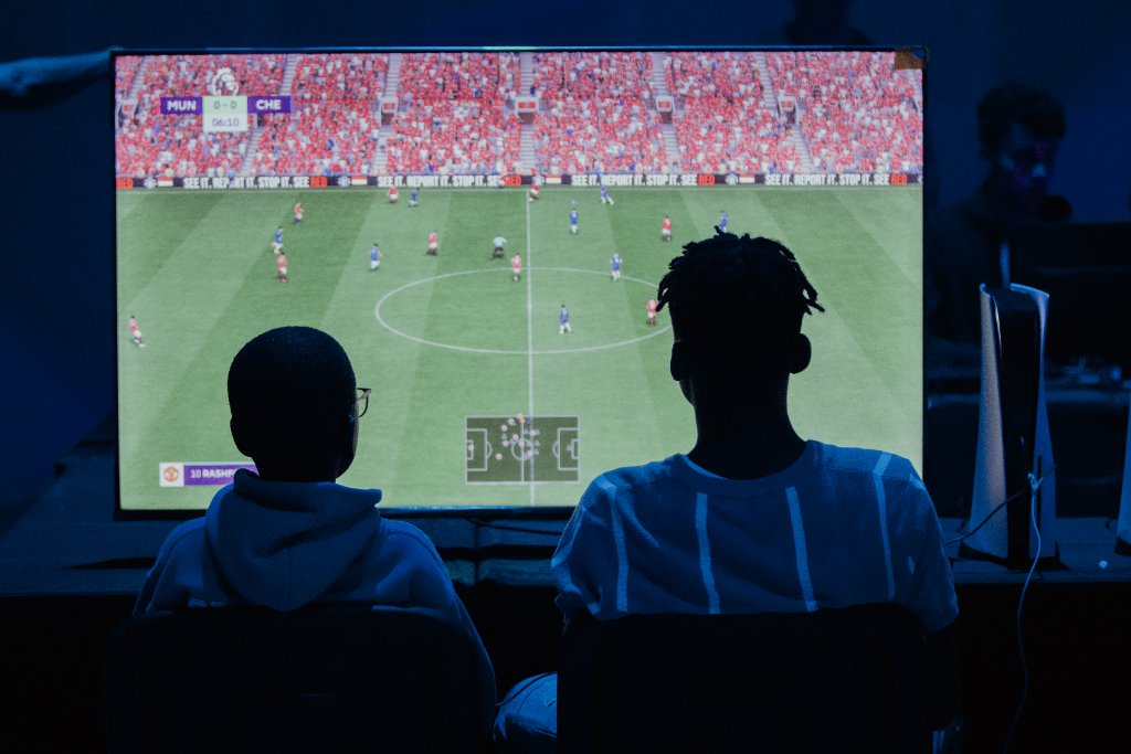 Young players competing on FC at Victory Gaming