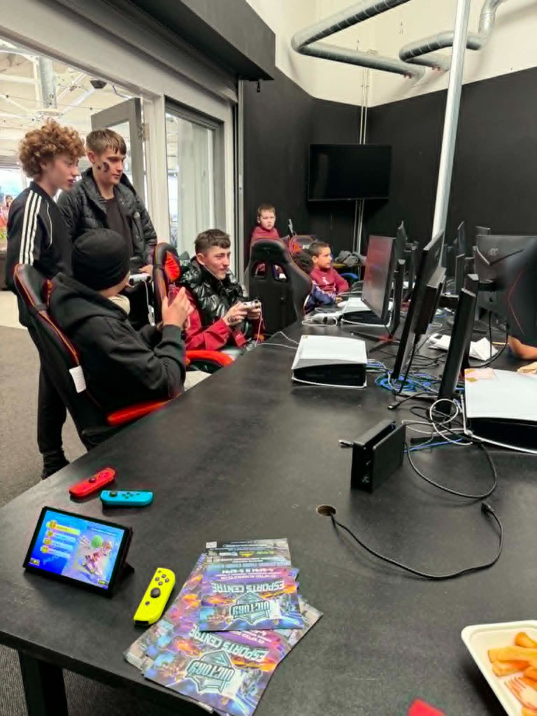 Teens gaming together at the venue