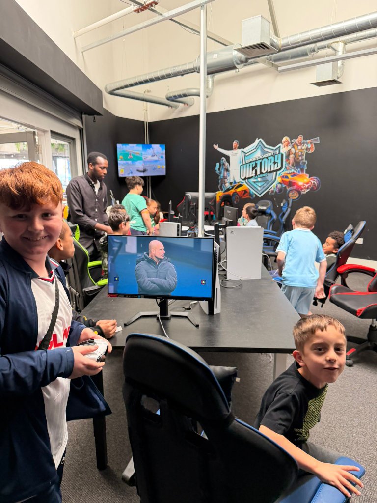 Kids enjoying esports coaching
