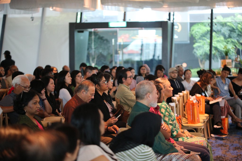 Attendees at a public mental health education event