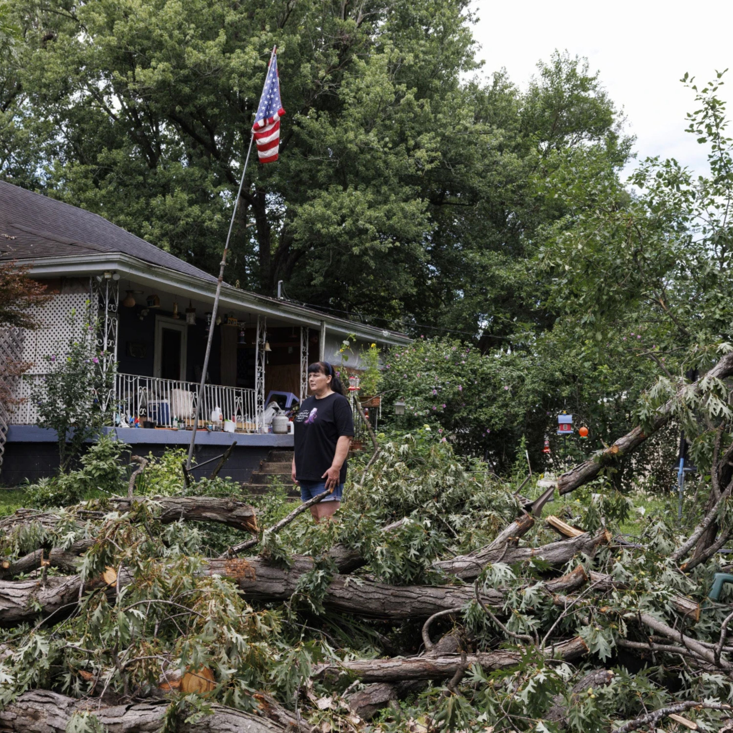 Gary, Indiana resident amid storm debris — Voice Up relief story