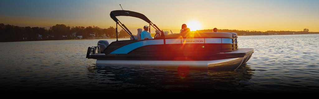 Bennington M Series pontoon at sunset