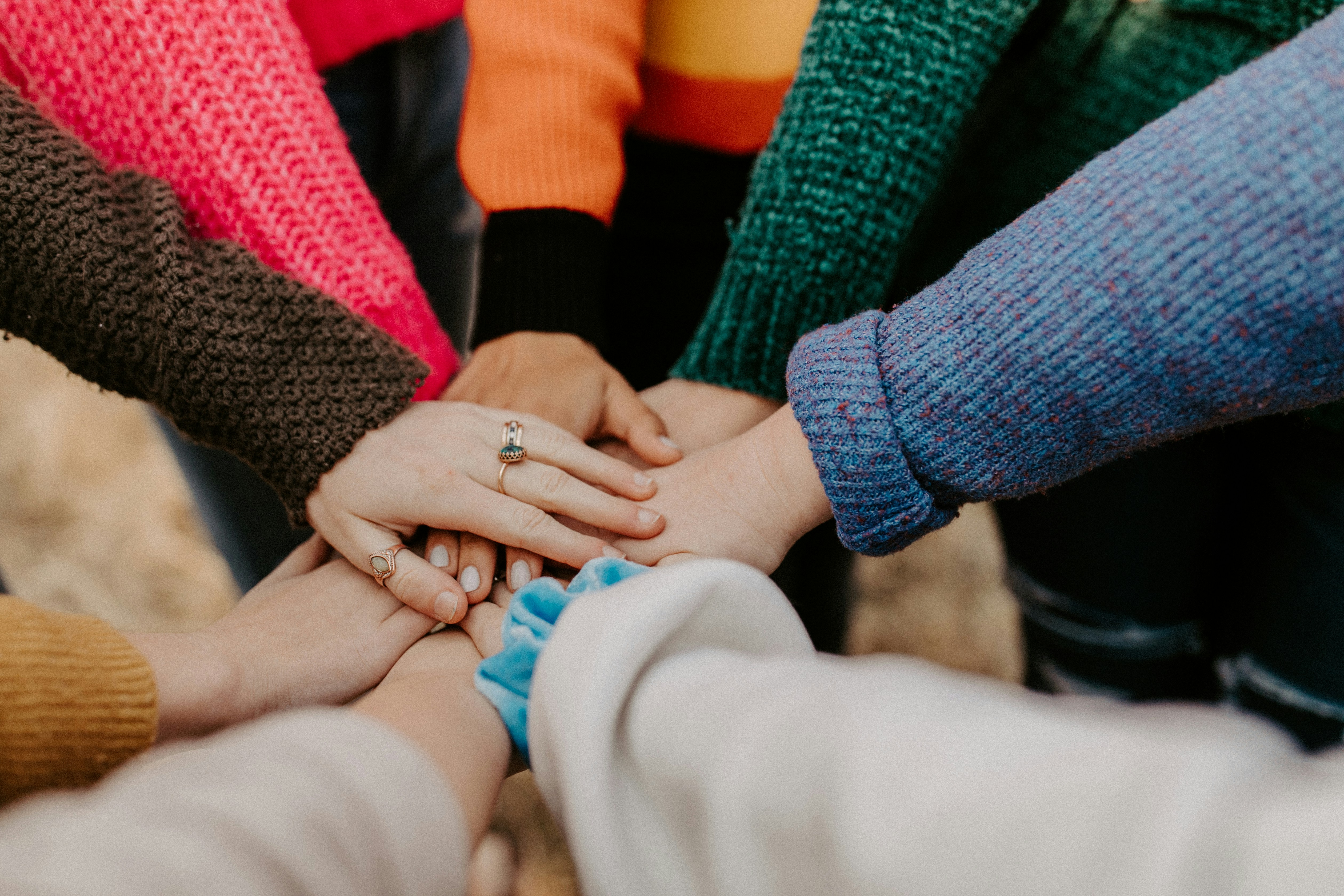 Hands joined together in an act of kindness