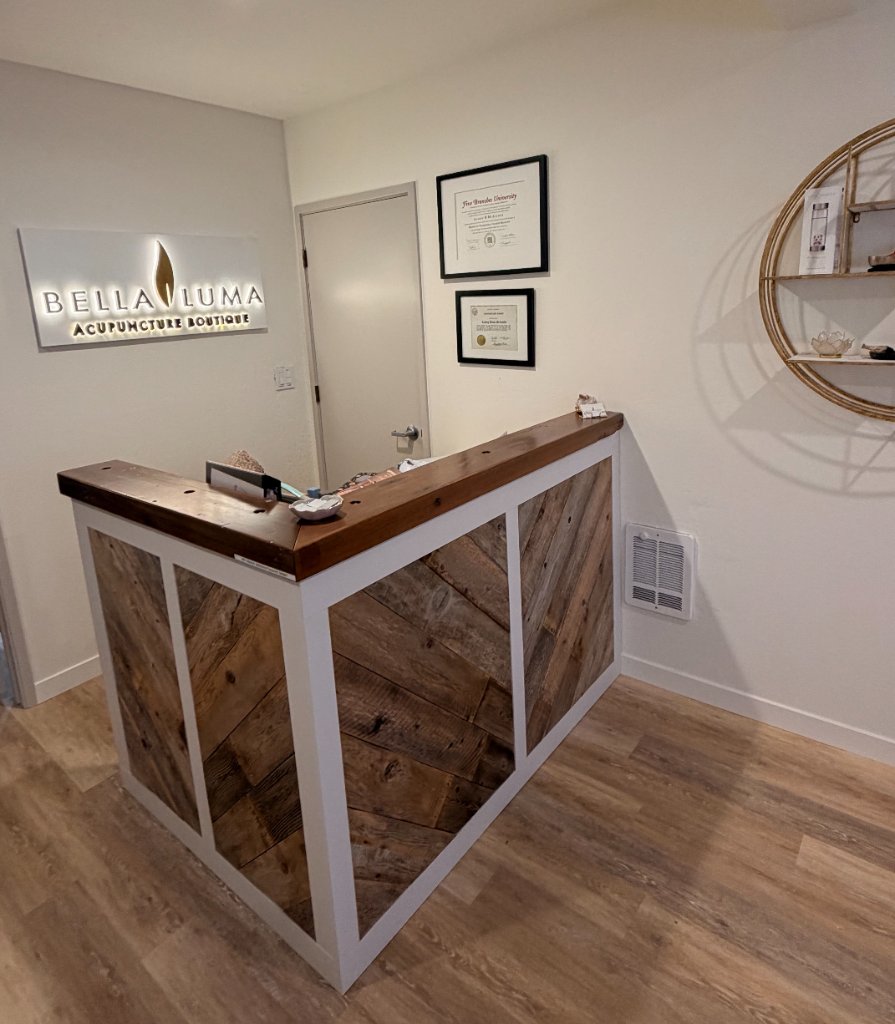 Bella Luma reception desk with illuminated sign