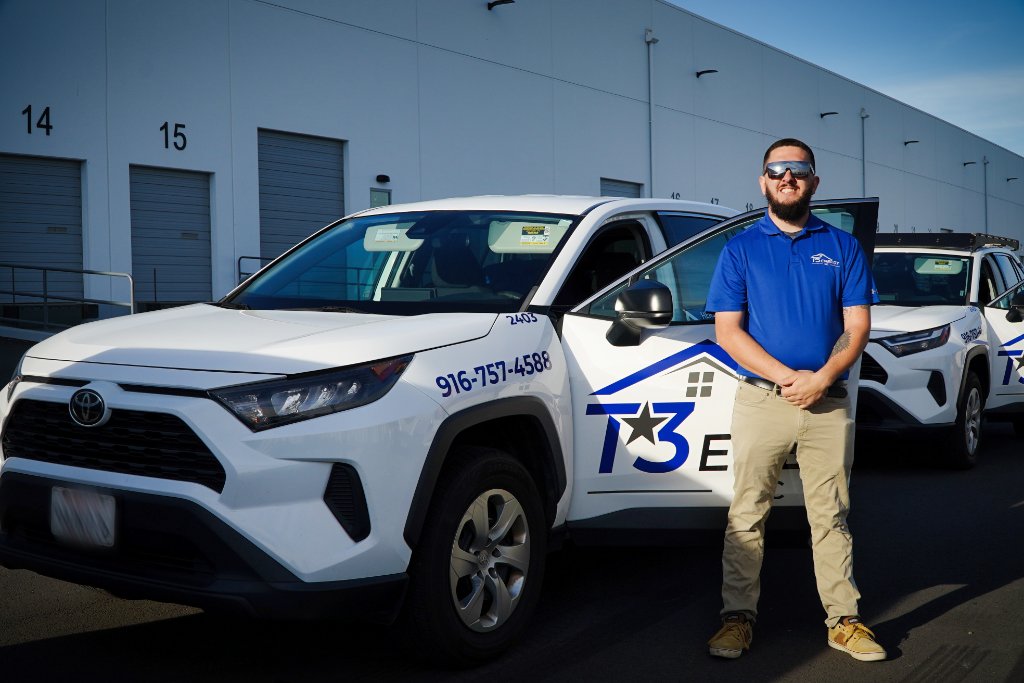 T3 Energy Inc. team member with company vehicle