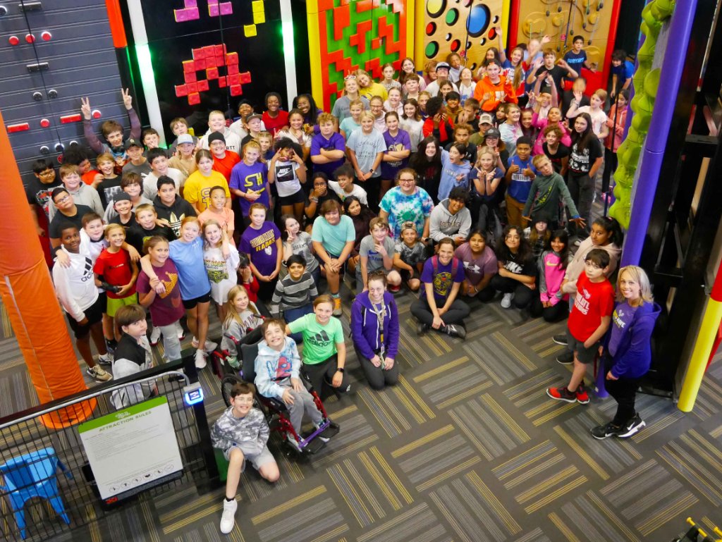 Baseline Middle School students group photo inside Allegan Event facility