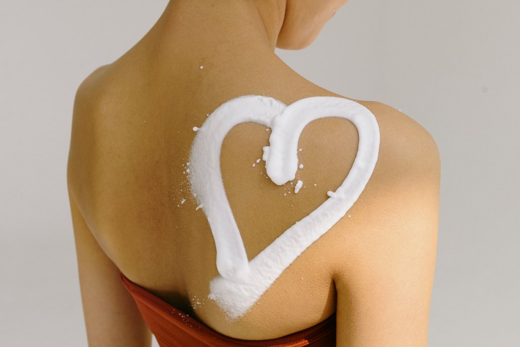 A calming skin-care image with a heart shape on the back