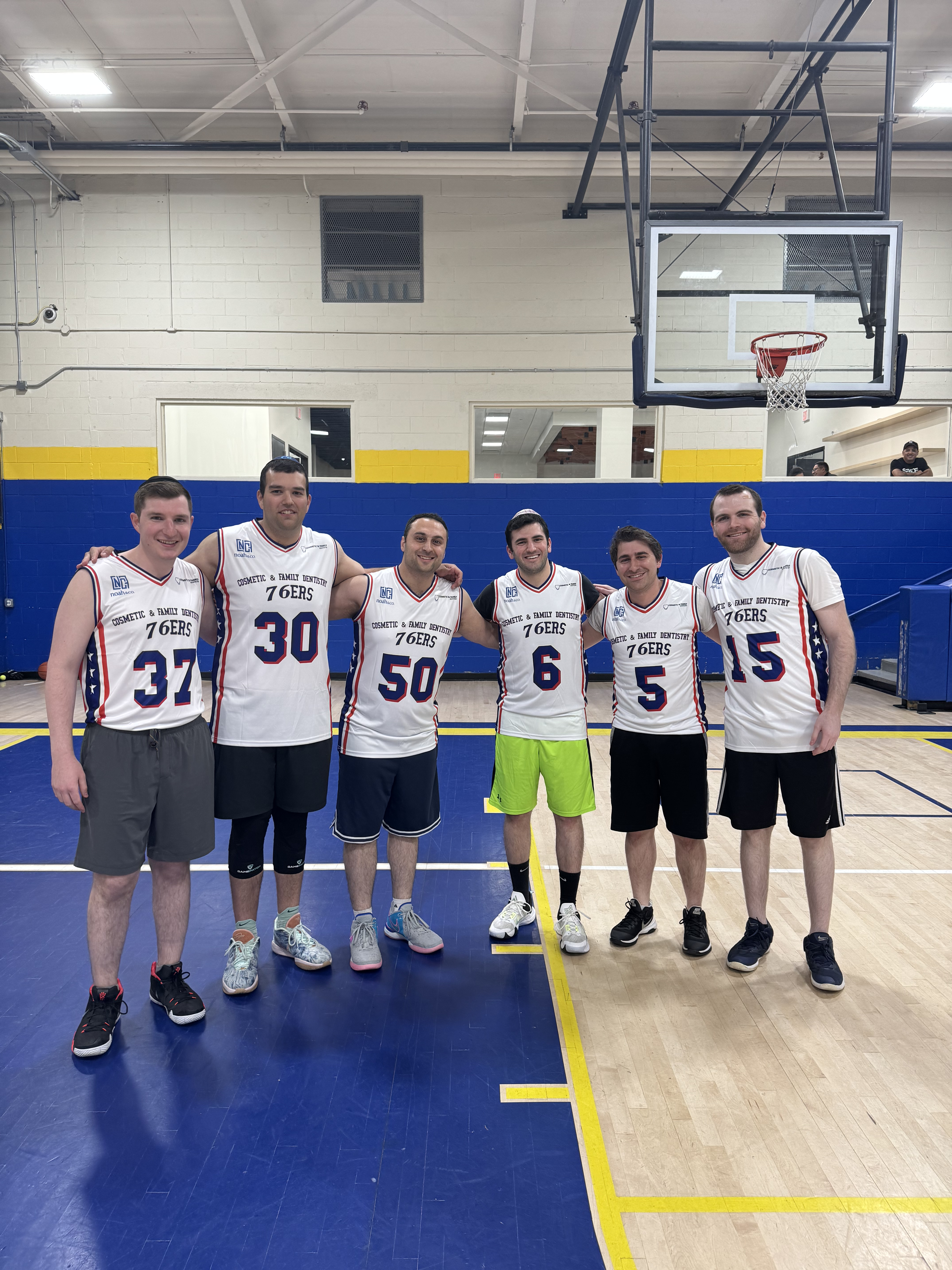 Cosmetic & Family Dentistry 76ers team photo