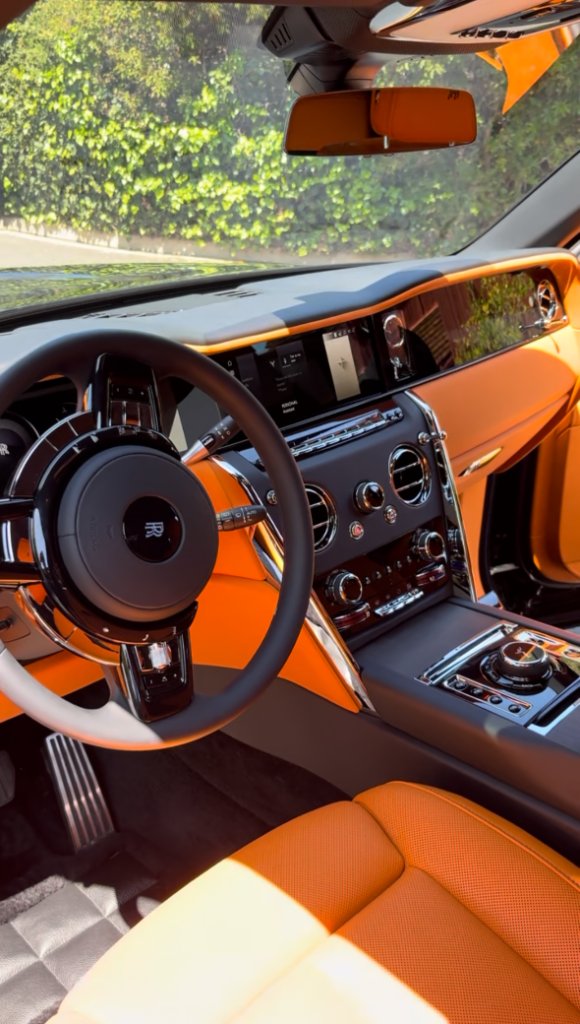 Luxury interior with conditioned orange leather after a Signature full detail