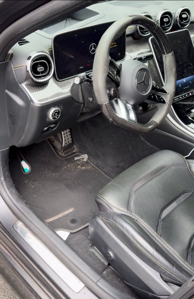 Vehicle interior with soiled carpets and upholstery before mobile detailing in Orange County