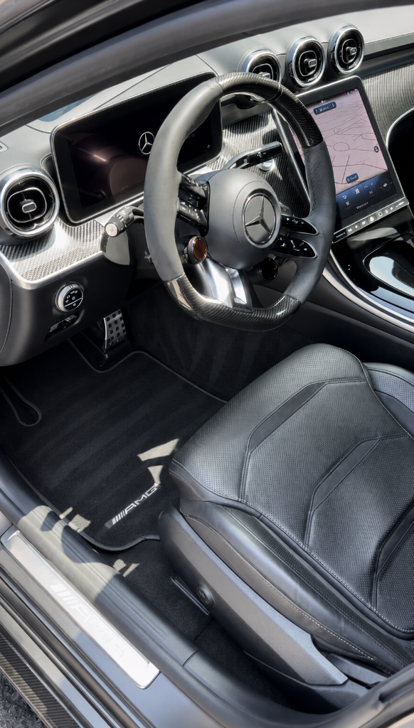 Restored vehicle interior with deep-cleaned carpets and conditioned leather after a Polish Theory mobile detail